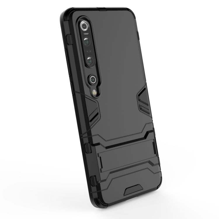 Black rugged protective phone case with textured back and camera-module openings