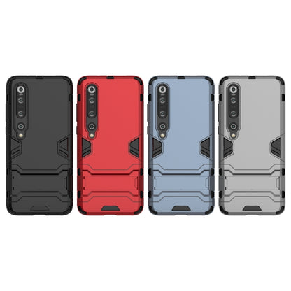Rugged protective phone cases in multiple colors with armored texture and camera cutouts