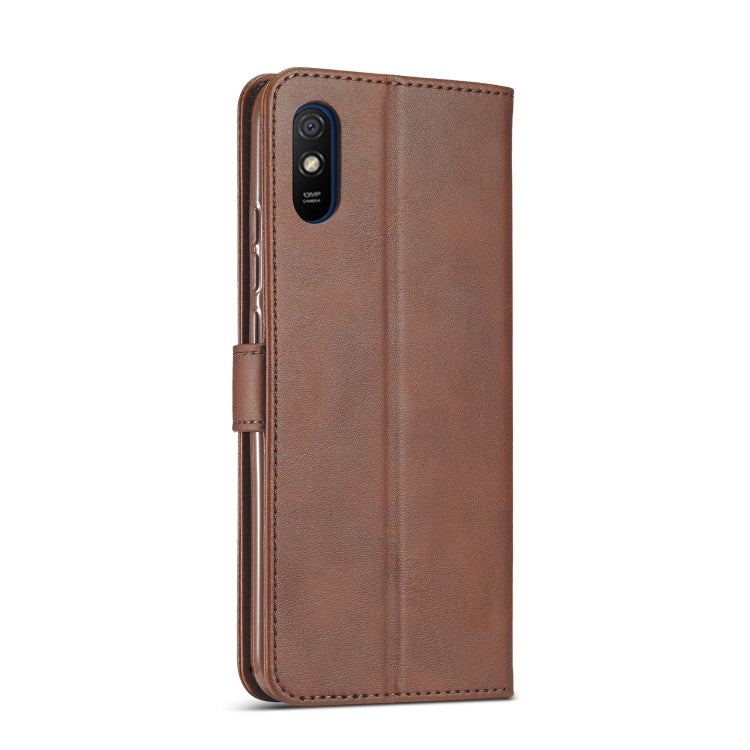 Brown leather flip phone case with camera cutout and side strap