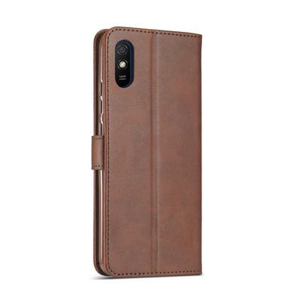 Brown leather flip phone case with camera cutout and side strap