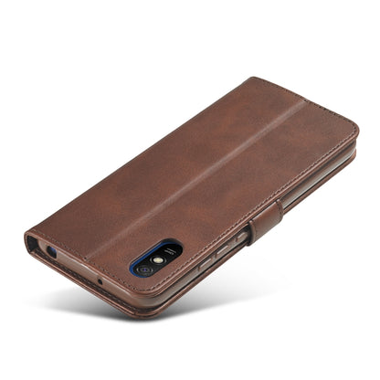 Brown leather flip phone case with slim profile and camera cutout