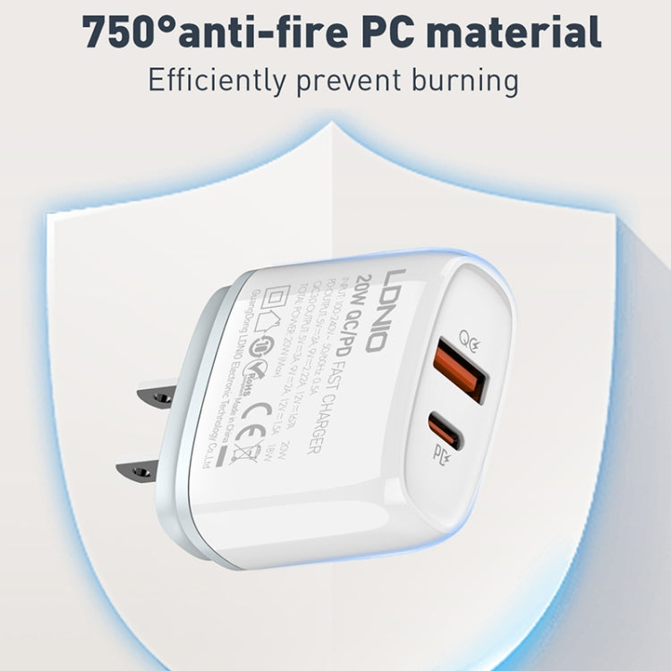 White wall USB-C and USB-A fast charger with two orange-lit ports