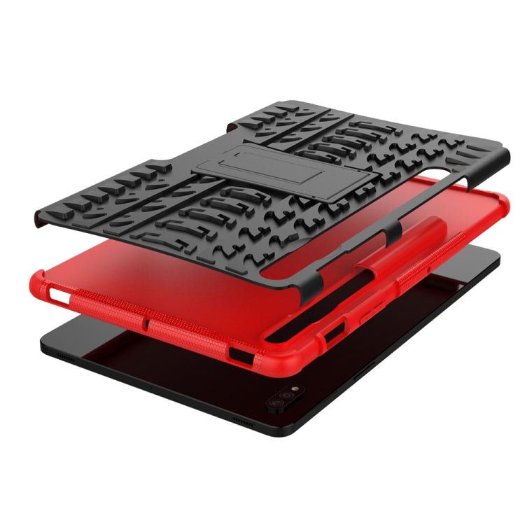 Red rugged tablet protective case with textured cover and stand, shown in folded view