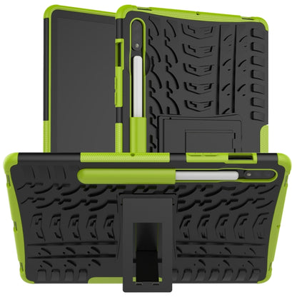 Rugged green shockproof tablet case with tire-texture grip and built-in stand