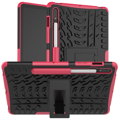 Rugged red shockproof tablet case with tire-texture grip and built-in stand