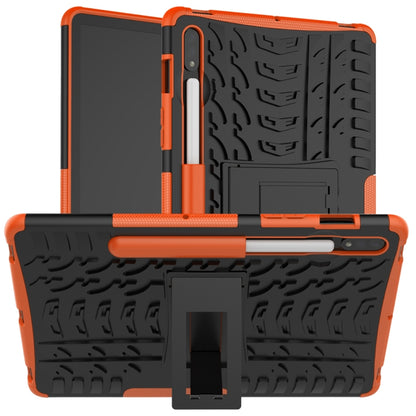 Rugged orange shockproof tablet case with tire-texture grip and built-in stand