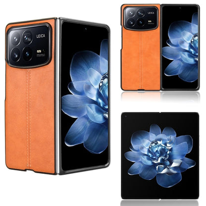 Flip-style sewing back phone case with orange faux-leather flap and black trim