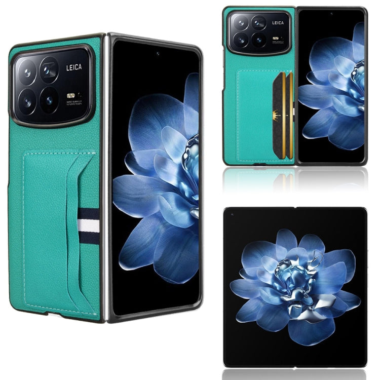 Green phone case with litchi texture and card slot; flip cover with striped band.