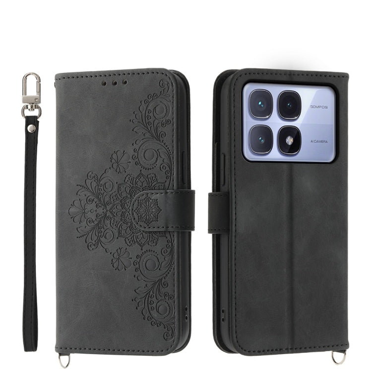 Dark gray embossed floral leather wallet phone case with wrist strap and stand-ready design