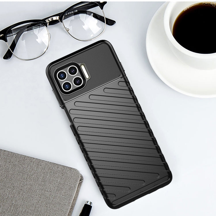 Black shockproof TPU phone case with ridged grip pattern and camera cutouts
