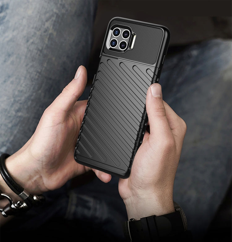 Shockproof TPU phone case in black with ridged side grip and camera module cutout