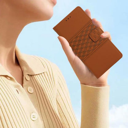Brown diamond-embossed leather phone case held in hand