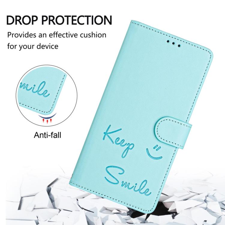 Mint green leather folio phone case with embossed smile, protective flip cover