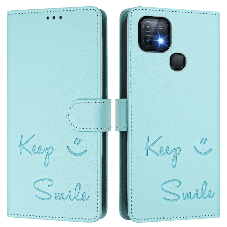 Mint blue leather folio phone case with embossed smile text and snap strap