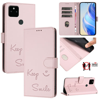 Light pink RFID leather phone case with embossed smile pattern and side wallet flap.
