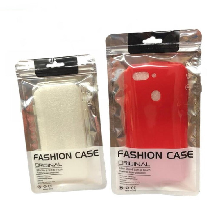 Two silver self-sealing packaging bags with red and gold phone cases inside