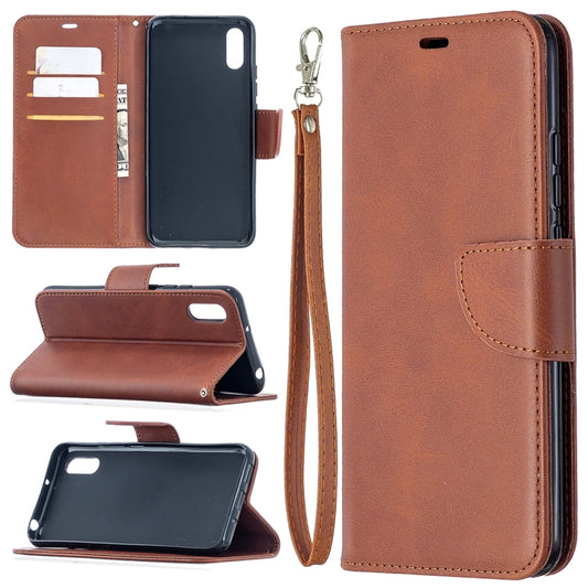Brown flip phone case wallet with card slots and wrist lanyard, for a smartphone
