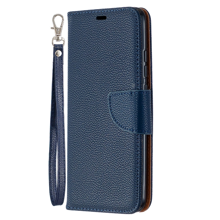 Dark blue flip wallet phone case with card holder window and attached wrist lanyard
