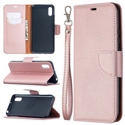 Pink PU leather wallet phone case with card slots and wrist lanyard strap