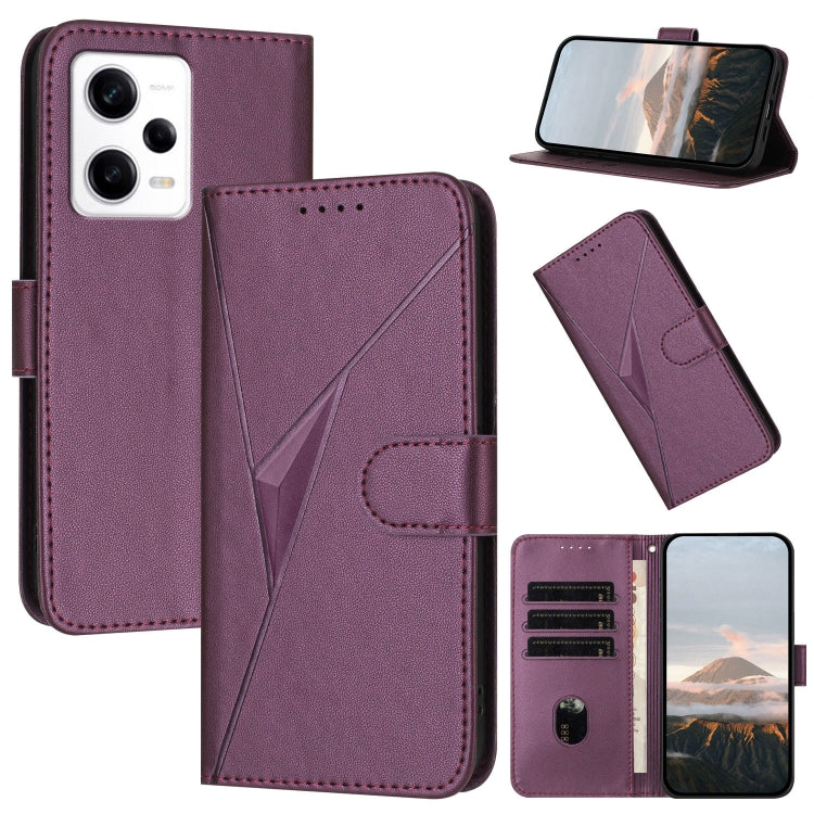 Plum purple leather phone case with triangle pattern, buckle clasp, and card slots