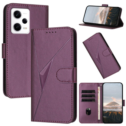 Plum purple leather phone case with triangle pattern, buckle clasp, and card slots