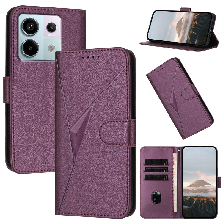 Dark purple leather phone case with triangle pattern, buckle clasp, and card slots