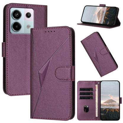 Dark purple leather phone case with triangle pattern, buckle clasp, and card slots