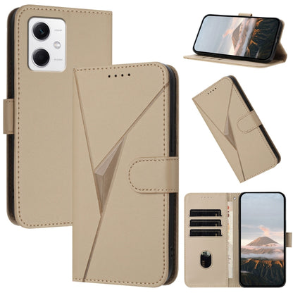 Light beige leather folio phone case with triangle pattern, buckle clasp, stand view