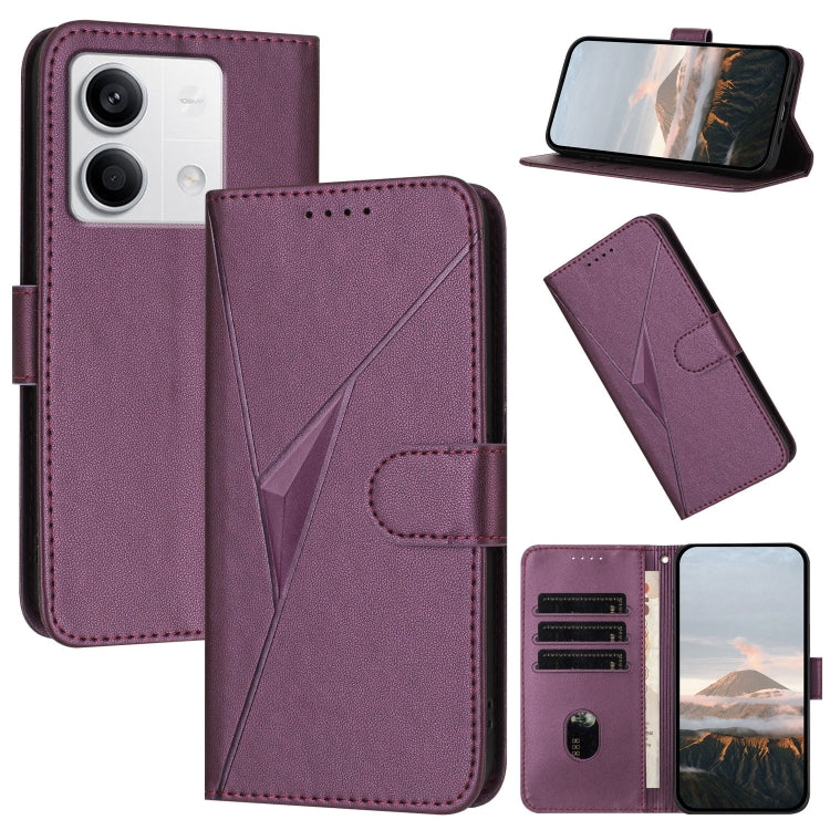 Dark purple leather phone case with triangle pattern, buckle clasp, and card slots
