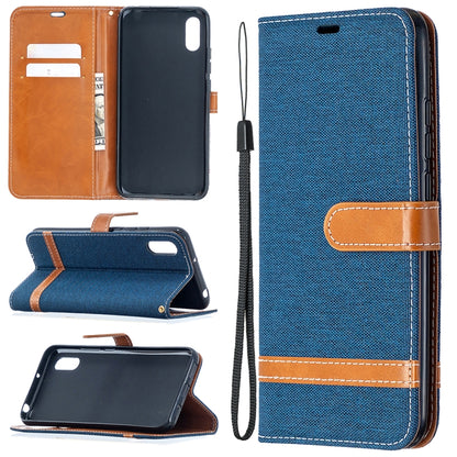 Greenish-teal denim-texture flip phone wallet case with card slots and lanyard strap