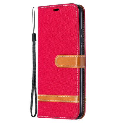 Red denim-texture flip phone wallet case with tan trim and lanyard strap