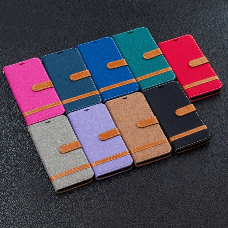 Assorted denim-texture flip phone wallet cases with tan card-slot accents in multiple colors