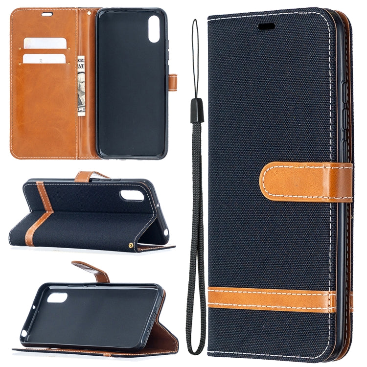 Navy denim-texture flip phone wallet case with card slots and lanyard strap