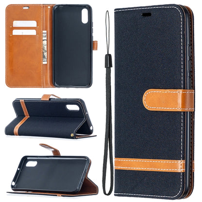 Navy denim-texture flip phone wallet case with card slots and lanyard strap