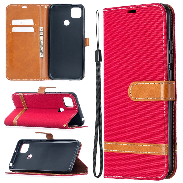 Red denim-texture flip phone wallet case with tan accents, card slots, and lanyard strap