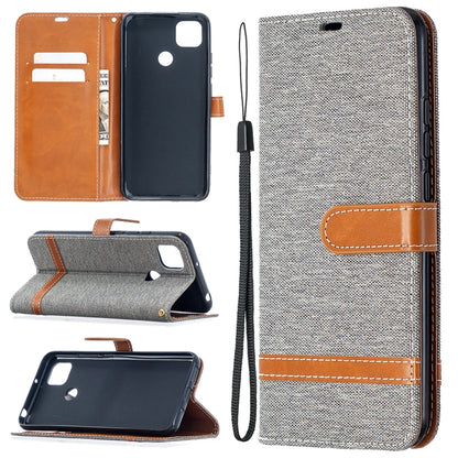 Grey denim-textured flip case with card holder, phone cover, and lanyard; brown trim.