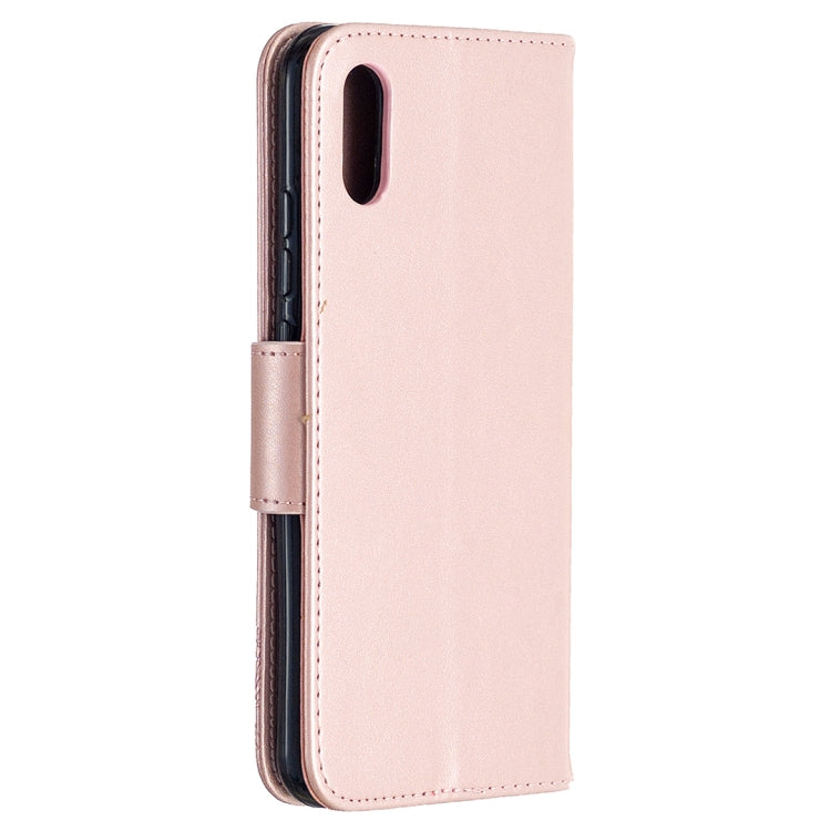 Rose gold smooth phone wallet case with stitched edges and magnetic flap closure