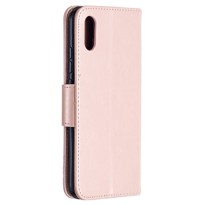 Rose gold smooth phone wallet case with stitched edges and magnetic flap closure