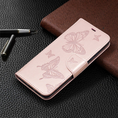 Rose gold butterfly embossed phone wallet case with card slot and fold-over flap