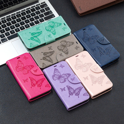 Assorted butterfly phone wallet cases with card slots and fold-over closures