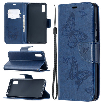 Blue leather-look phone wallet case with butterfly print, card slots, stand, and lanyard
