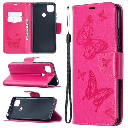 Hot pink leather-look phone wallet case with butterfly print, card slots, stand, and lanyard