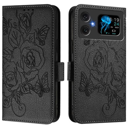 Black embossed rose leather flip phone case with magnetic flap and camera cutout