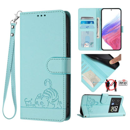 Mint green RFID leather phone case with embossed cat-rat design and wrist lanyard, flip cover.