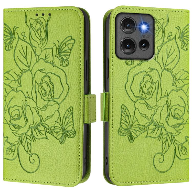 Green embossed rose leather phone case with flip cover and side strap.