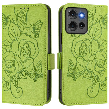 Green embossed rose leather phone case with flip cover and side strap.