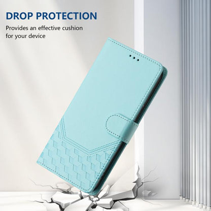 Mint green honeycomb embossed leather flip phone case with strap loop and camera opening