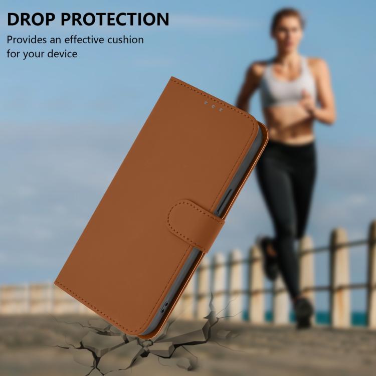 Brown leather flip phone case with lanyard loop and side protection, angled front view