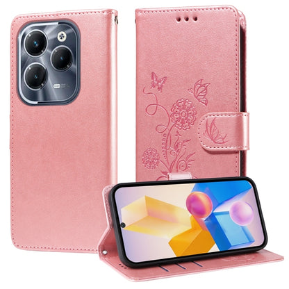 Pink leather flip phone case with embossed butterfly-flower design, shown with phone