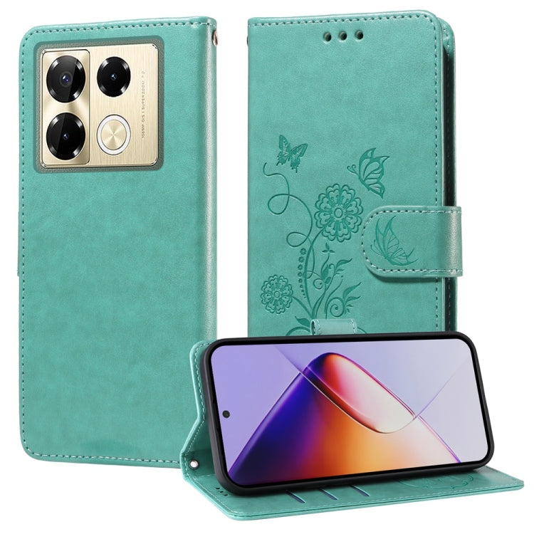 Teal leather phone case with embossed butterfly and flower design, flip cover